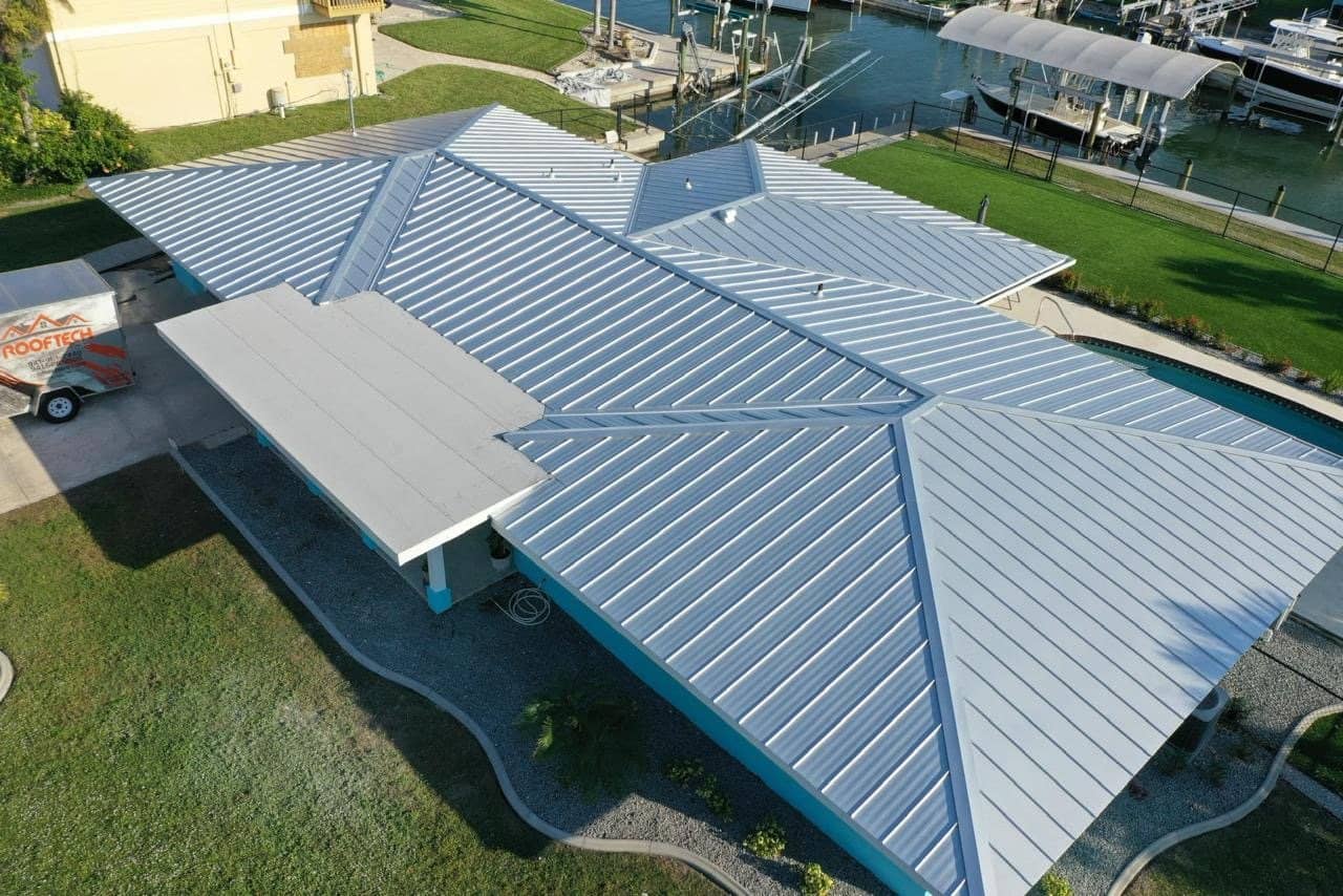Aerial view of a residential metal roof replacement in Dania Beach