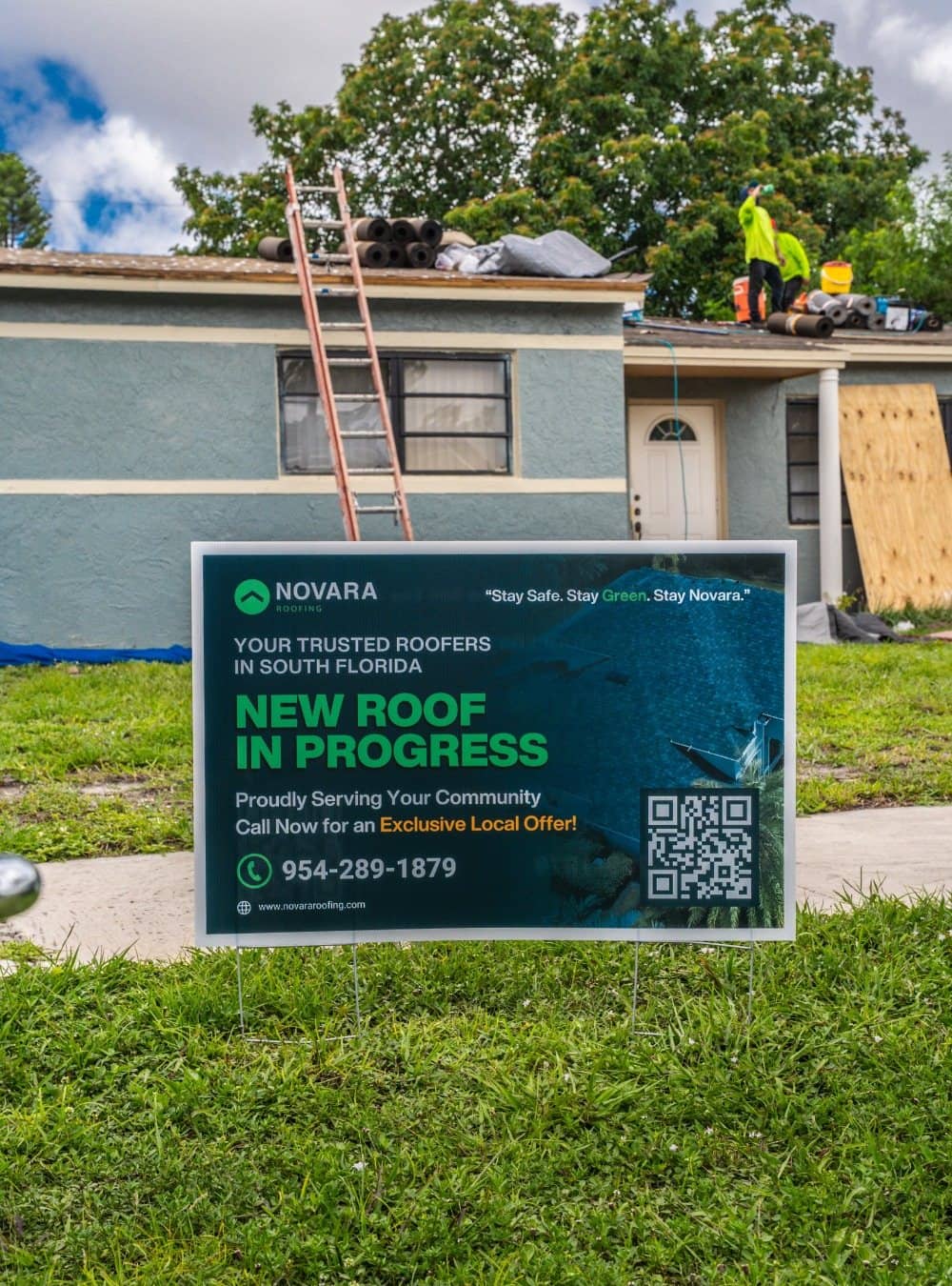 Novara Roofing “New roof in progress” yard sign in front of a home