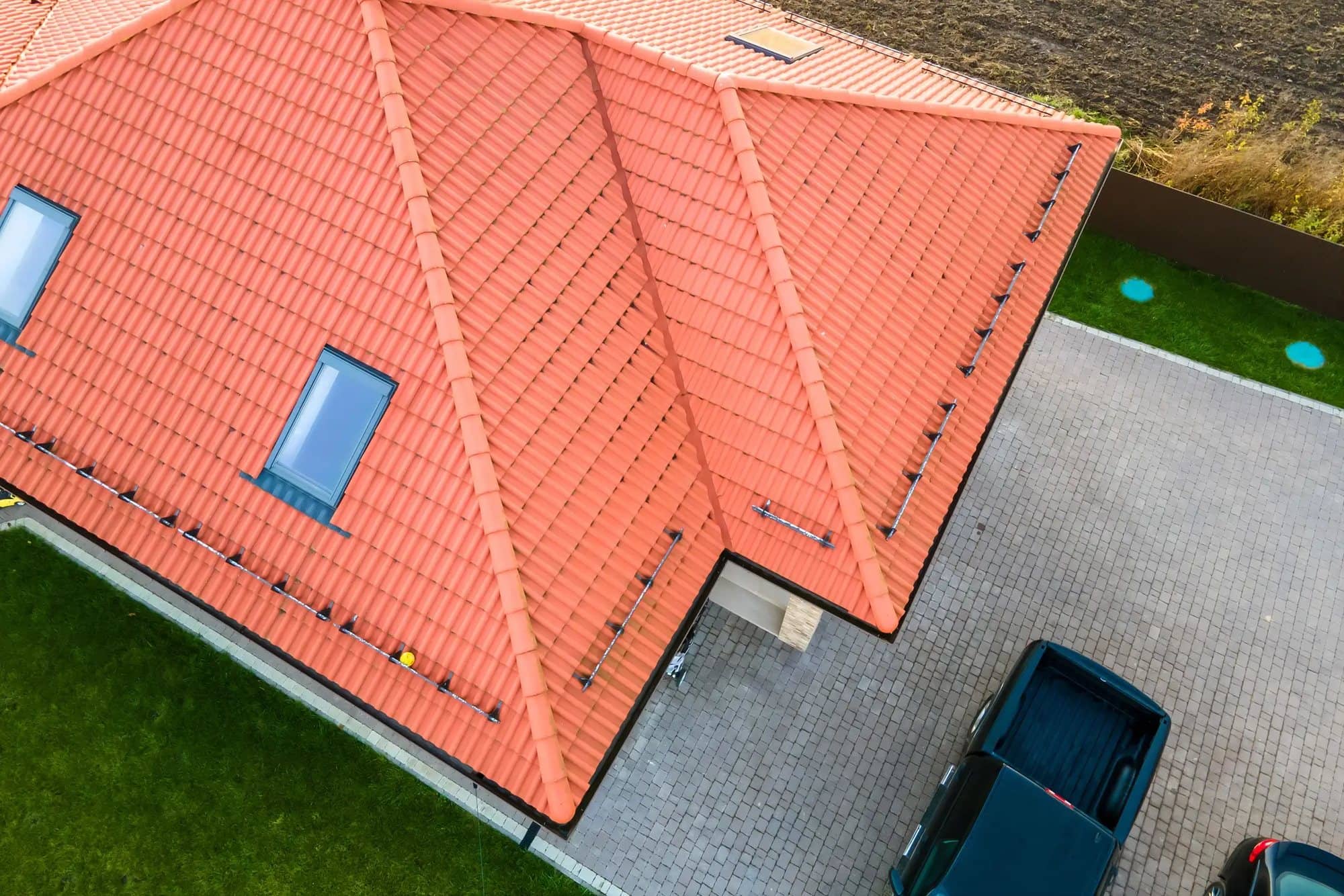 Aerial view of a residential tile roof replacement in Miami-Dade
