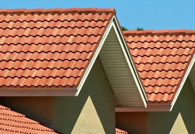 Orange clay tile roof with gables